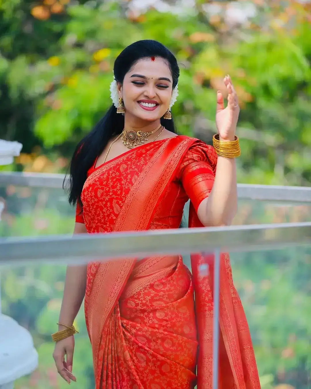 TELUGU TV ACTRESS ANU VARSHA PHOTOS IN ORANGE SAREE 5